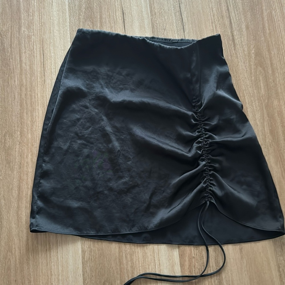 Aritzia black silk satin skirt with ruching on the side